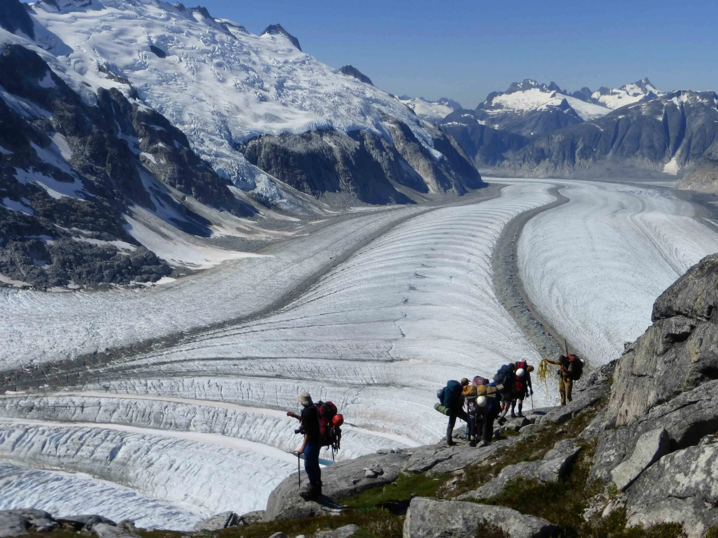 Descending "The Cleaver" - approaching the start of the series of fixed ropes - with the Gilkey Trench in the background. Photo by Adam Toolanen