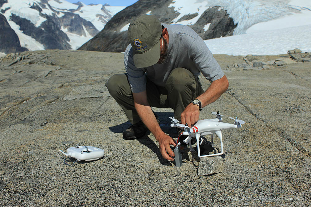  Paul Illsley sets up his quadcopter for a aerial photography flight over the Camp-18 nunatak.&nbsp; Photo by Mira Dutschke  