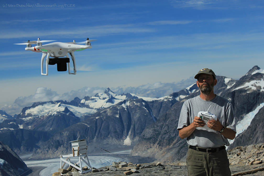  Paul Illsley begins a flight with the quadcopter at Camp 18.&nbsp; Photo by Mira Dutschke.  