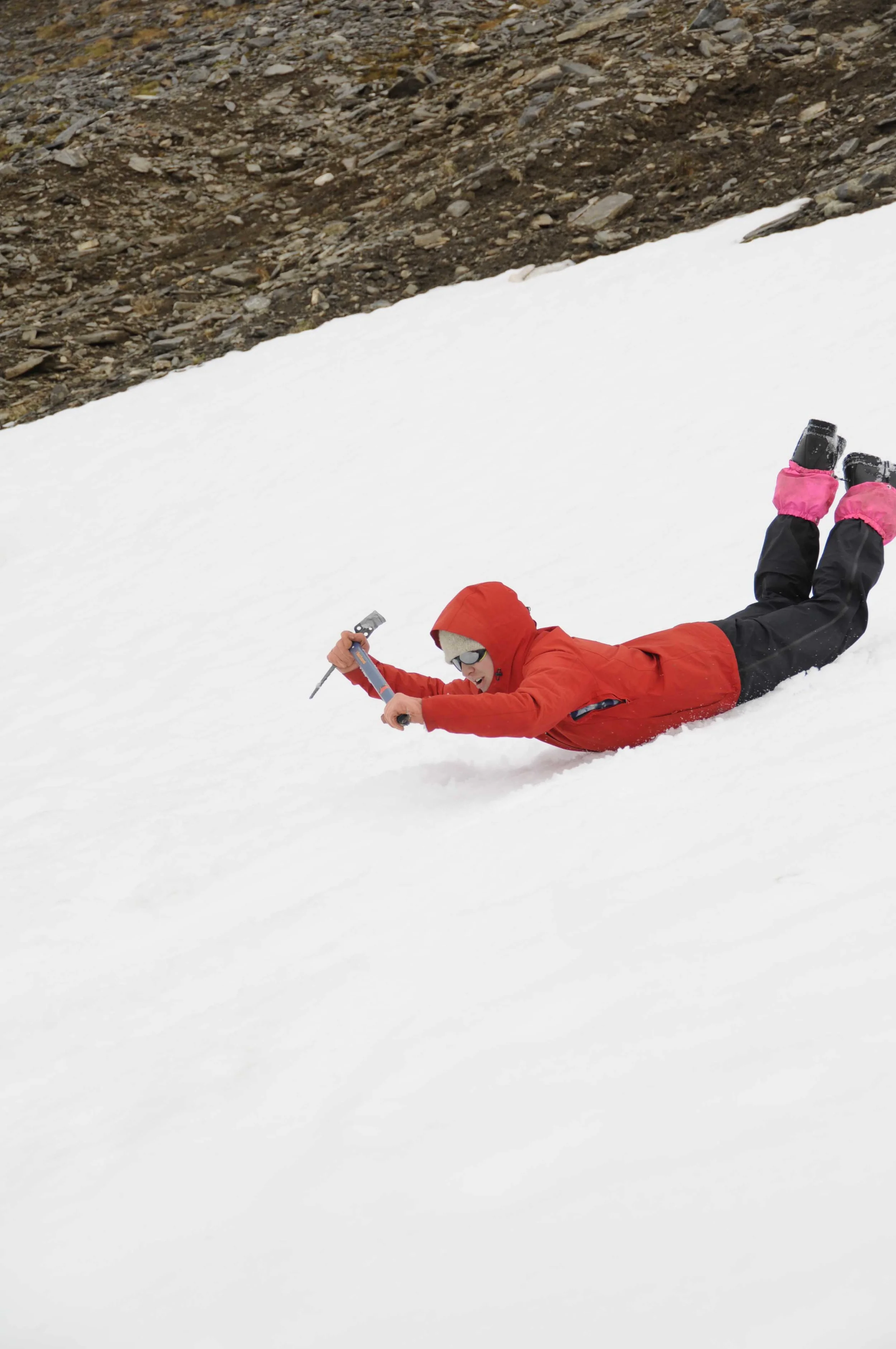 Kate Baustian demonstrates a self-arrest position. Photo by Jay Ach
