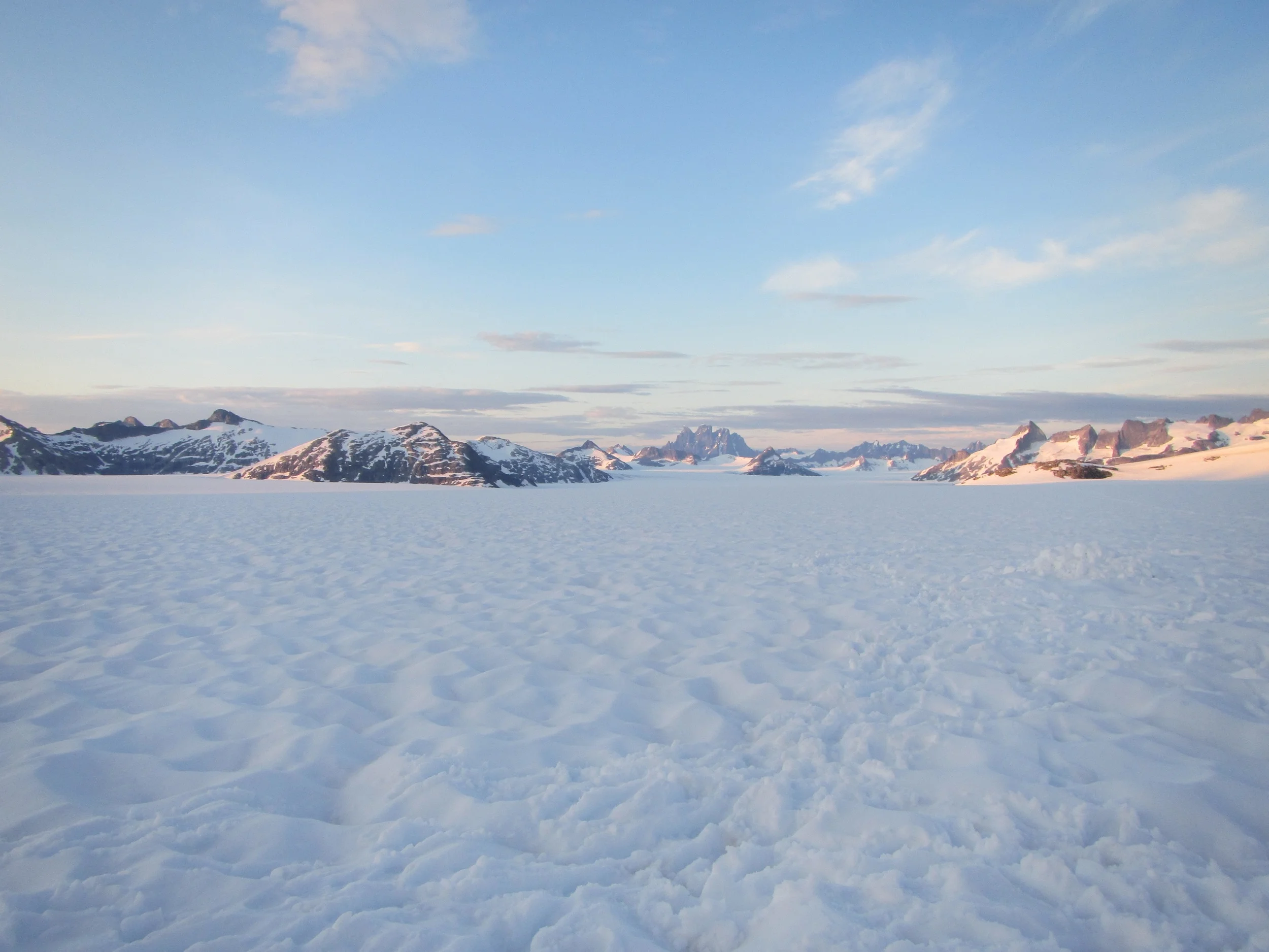 View of Devil's Paw at sunset from the Southwest Branch of the Taku glacier. photo by Gillian Rooker