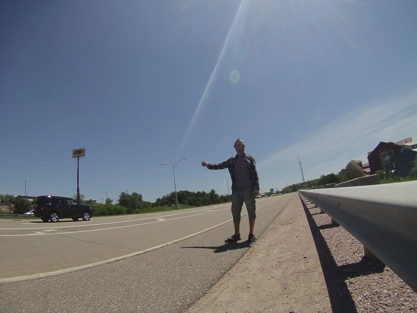 Hitchhiking in Wisconsin Dells, WI. Photo by author. 