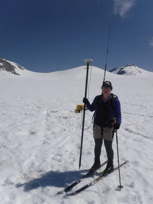 Ella using the Trimble GPS to survey the Lemon Creek Glacier. Photo by Mickey MacKie.