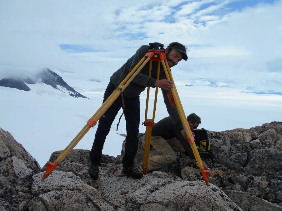Bjorn setting up a benchmark, which is used to correct for error given by satellites. Photo by Lara Hughes-Allen.