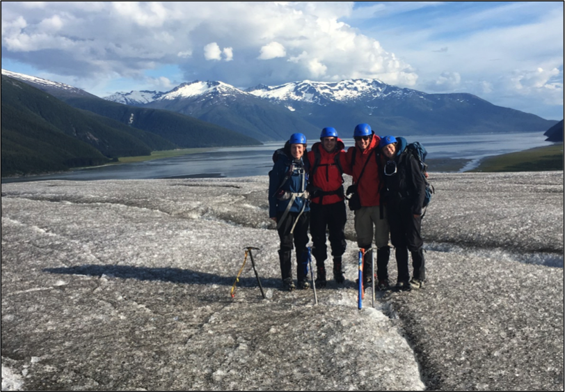 Olivia Truax, Alex Burkhart, Evan Koncewicz, and Cézy Semnacher on top of the ablation zone of the Taku Glacier.