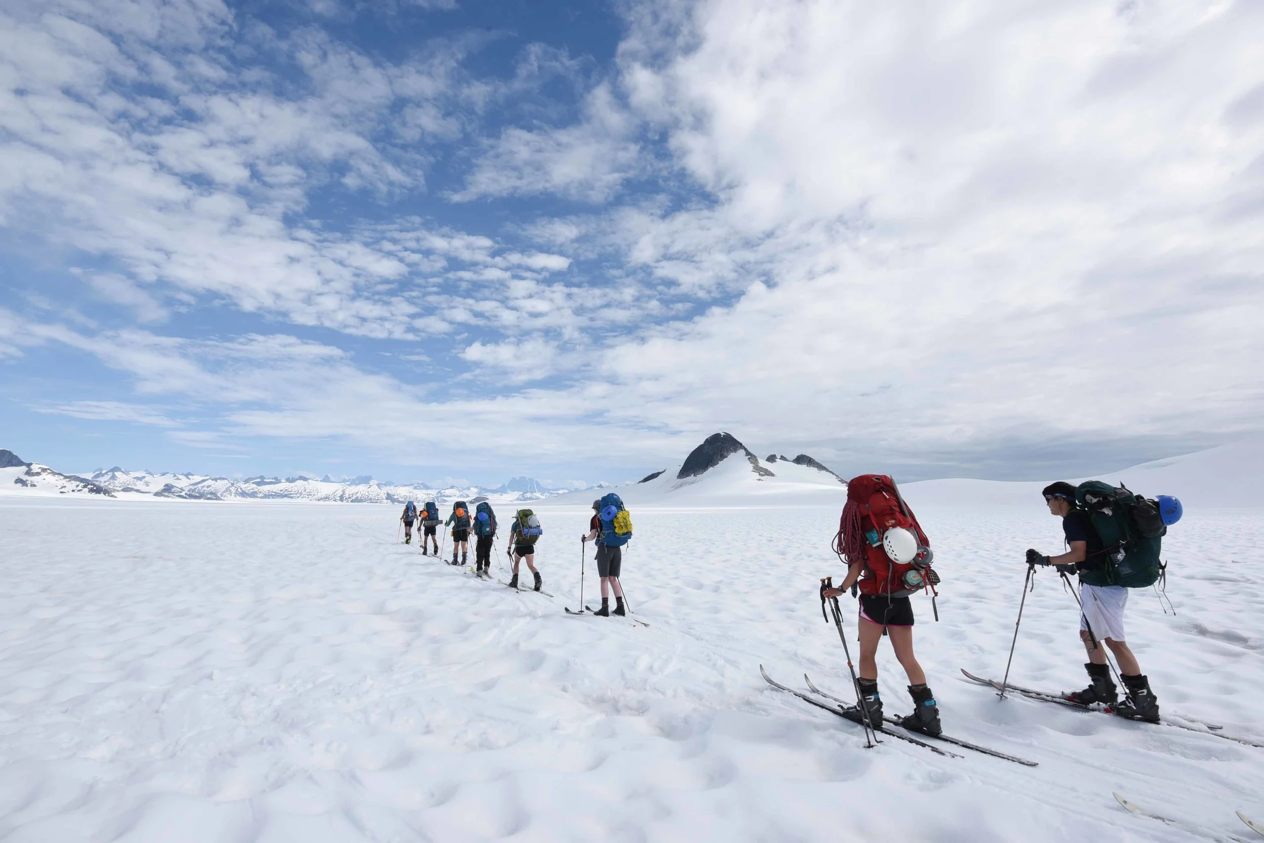 Louise and her trail party skiing the traverse from Camp 17 to Camp 10. Photo courtesy of PBJ Photography.