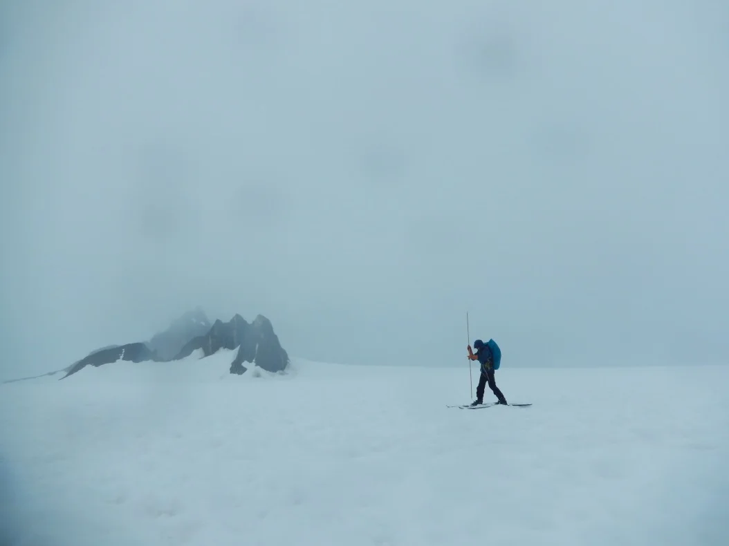 Olivia Truax collects snow depth data on the Northwest branch of Taku Glacier. Photo: Kate Bollen