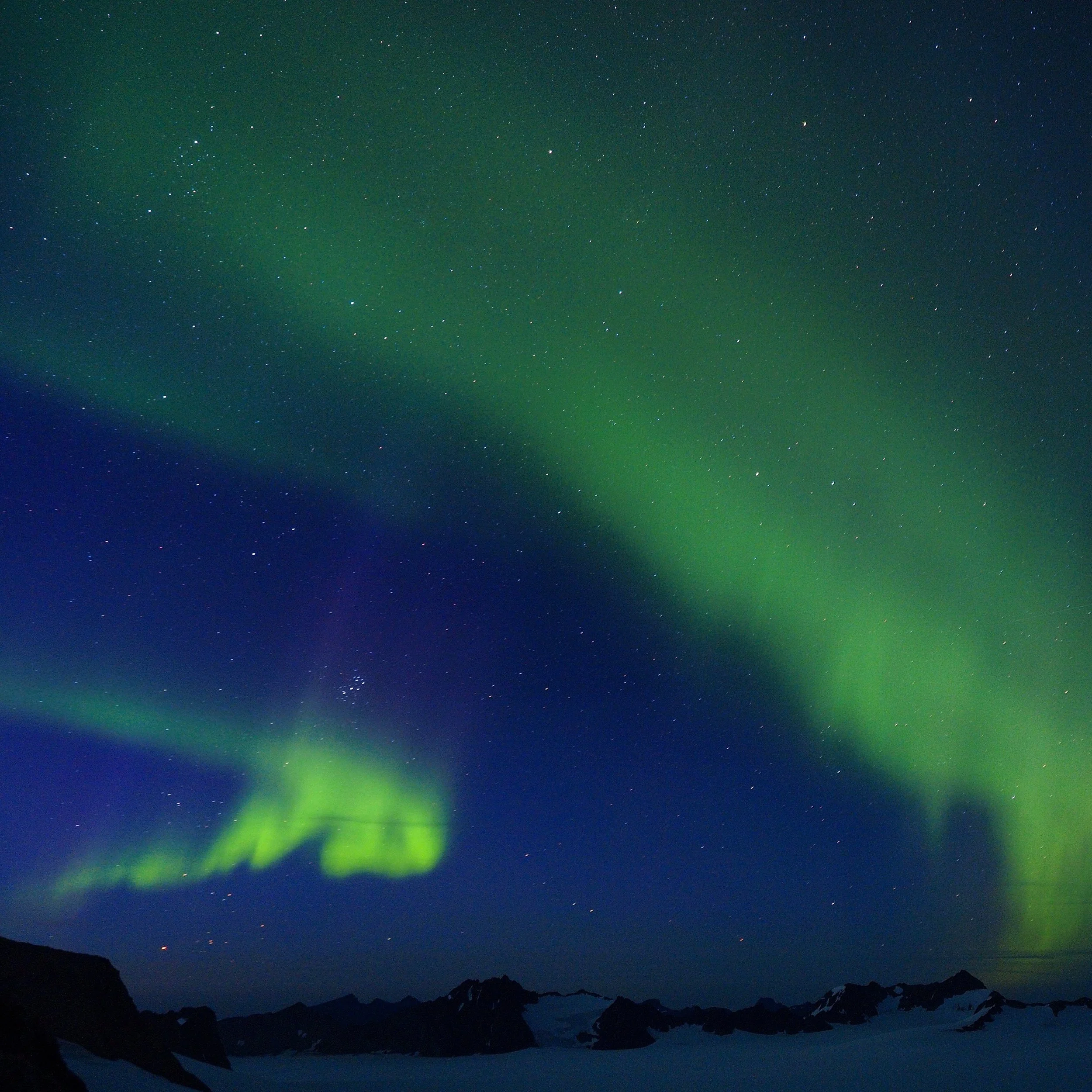 On clear nights toward the end of the summer JIRPers often sleep outside. Everyone falls asleep around 11:00 pm when it’s getting dark, but it’s not uncommon to wake up three hours later to shouts of “Lights! Northern lights!” Photo credit: Brad Markle.