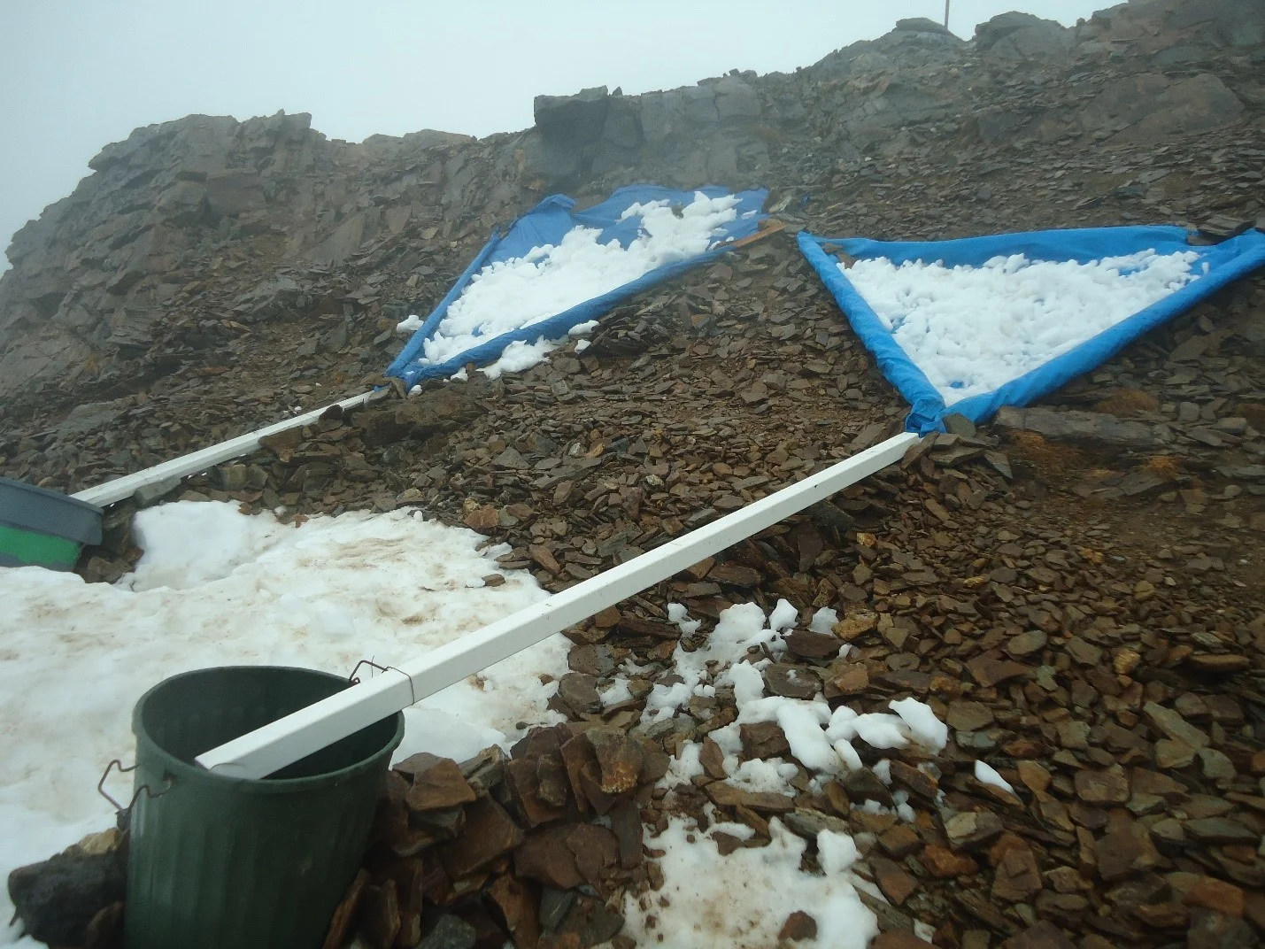 One of the first things we did upon arrival to camp was set up water collections. We did this by framing tarps with 2x4s to funnel into a gutter and then into a bin after shoveling surrounding snow onto the tarp. It’s good to scrape off the top layer before shoveling, but no filtering or purifying needed! Photo credit: Kelcy Huston.