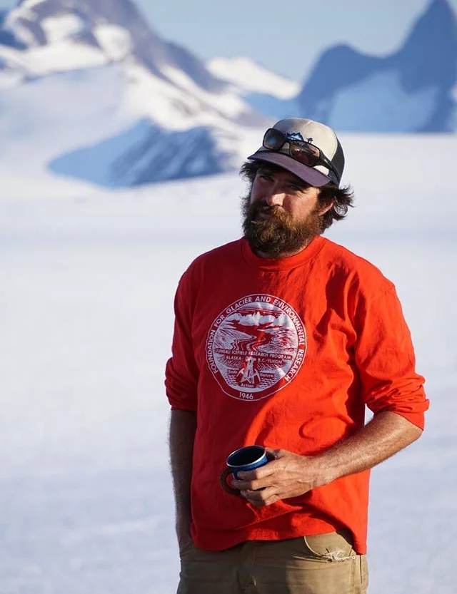 Chris McNeil (JIRP ‘09-present) models one of his many JIRP shirts at Camp 10. Photo: Billy Armstrong.
