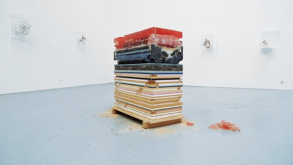  large scale plywood wax and concrete sculpture full of colors in a contemporary art gallery in new york 