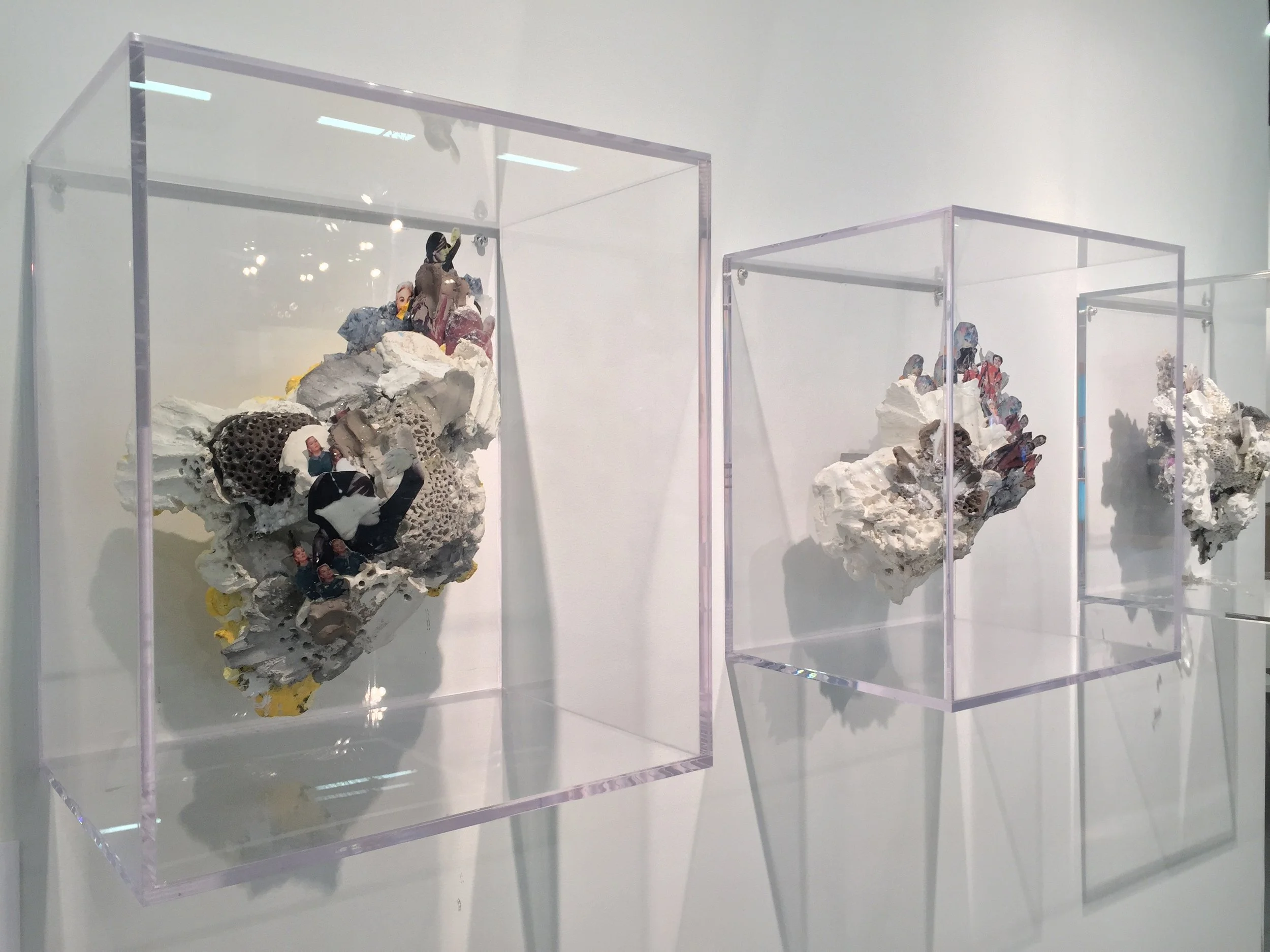  large scale plywood wax and concrete sculpture full of colors in a contemporary art gallery in new york 