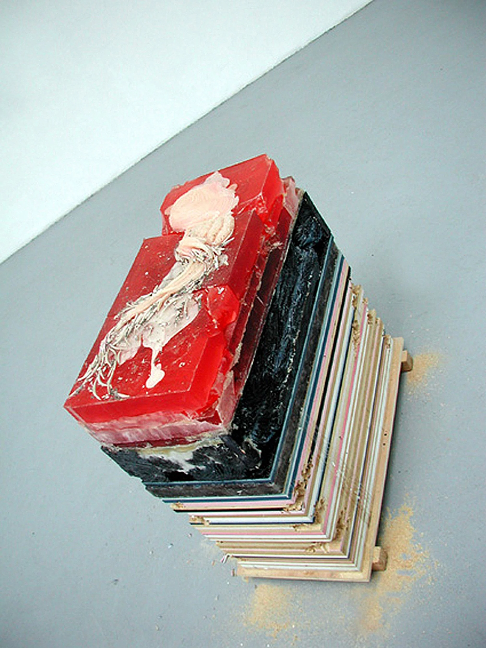  large scale plywood wax and concrete sculpture full of colors in a contemporary art gallery in new york 