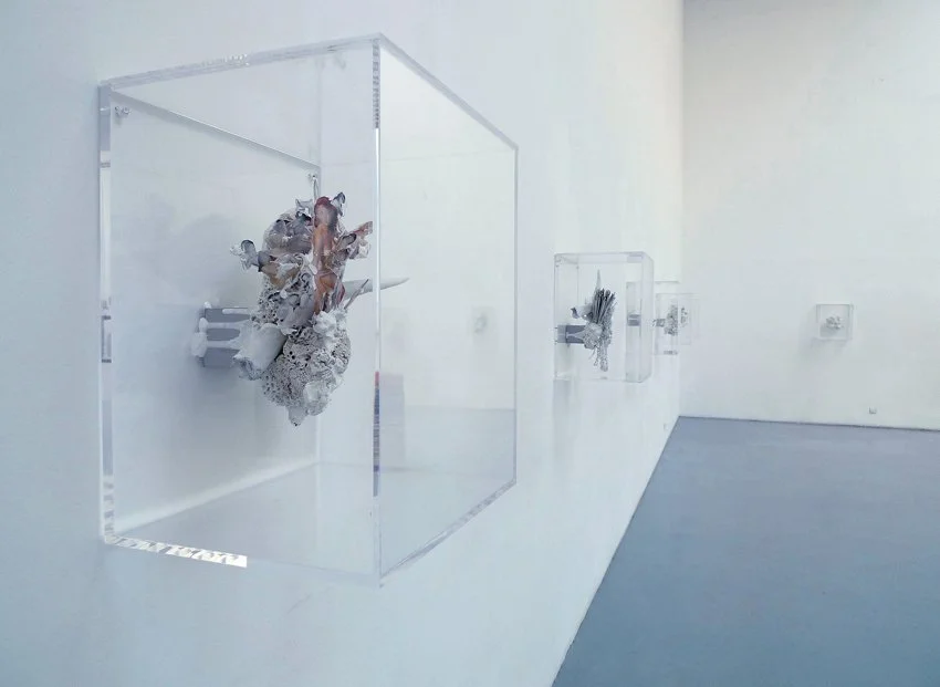  large scale plywood wax and concrete sculpture full of colors in a contemporary art gallery in new york 