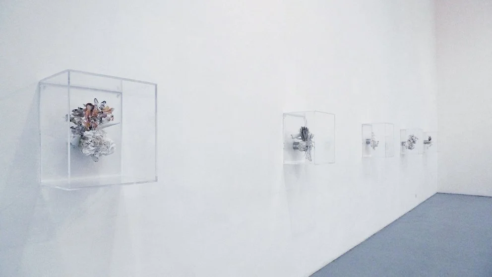  large scale plywood wax and concrete sculpture full of colors in a contemporary art gallery in new york 
