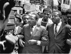Dr. Martin Luther King, Jr., and the Rev. Ralph Abernathy lead a march by sanitation workers in Memphis, March 28, 1968. Photo by Sam Melhorn / AP.