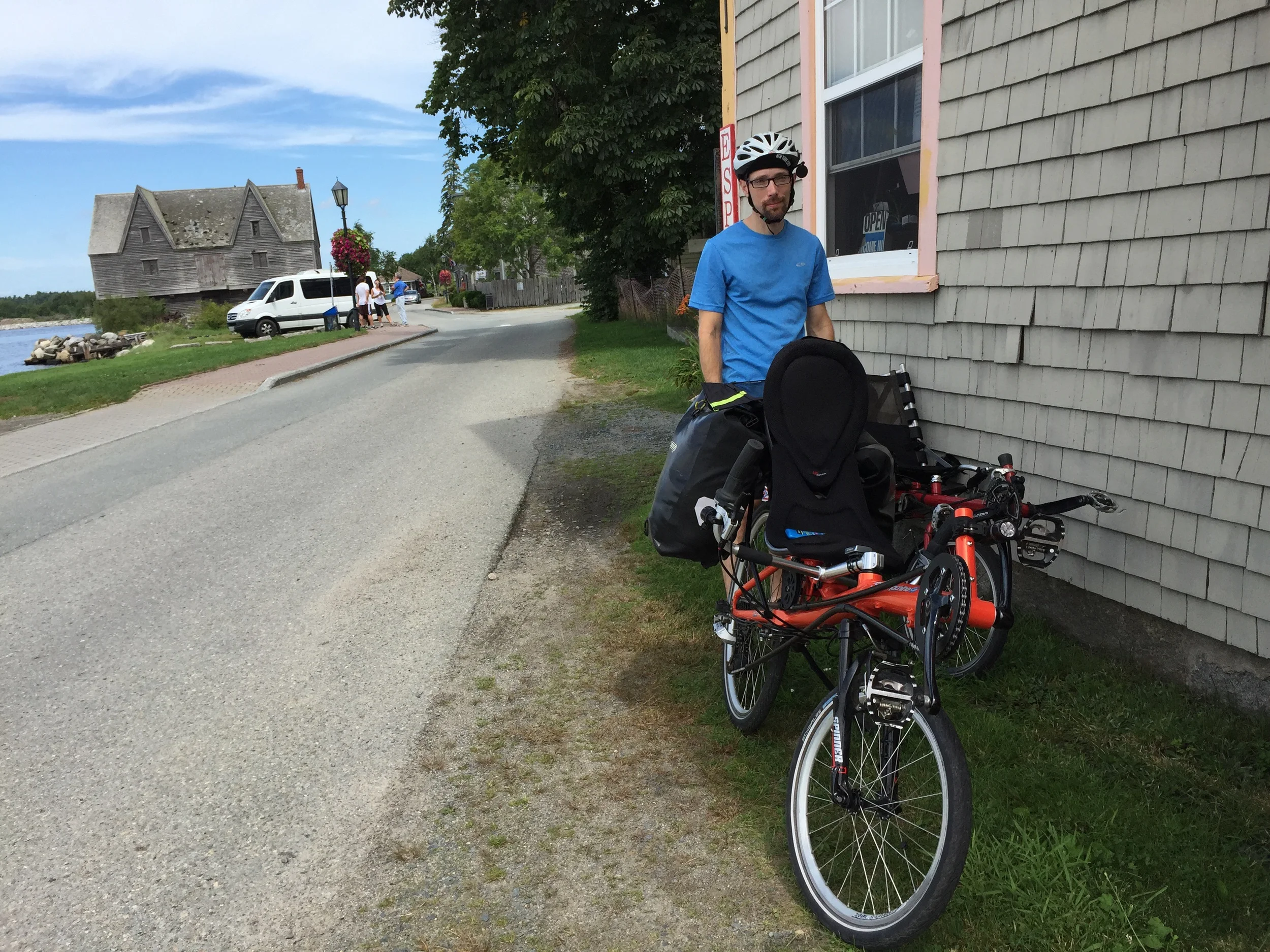Jacob, parking the bikes for breakfast this morning at a Shelburne cafe. total mileage at this point: 0.8.