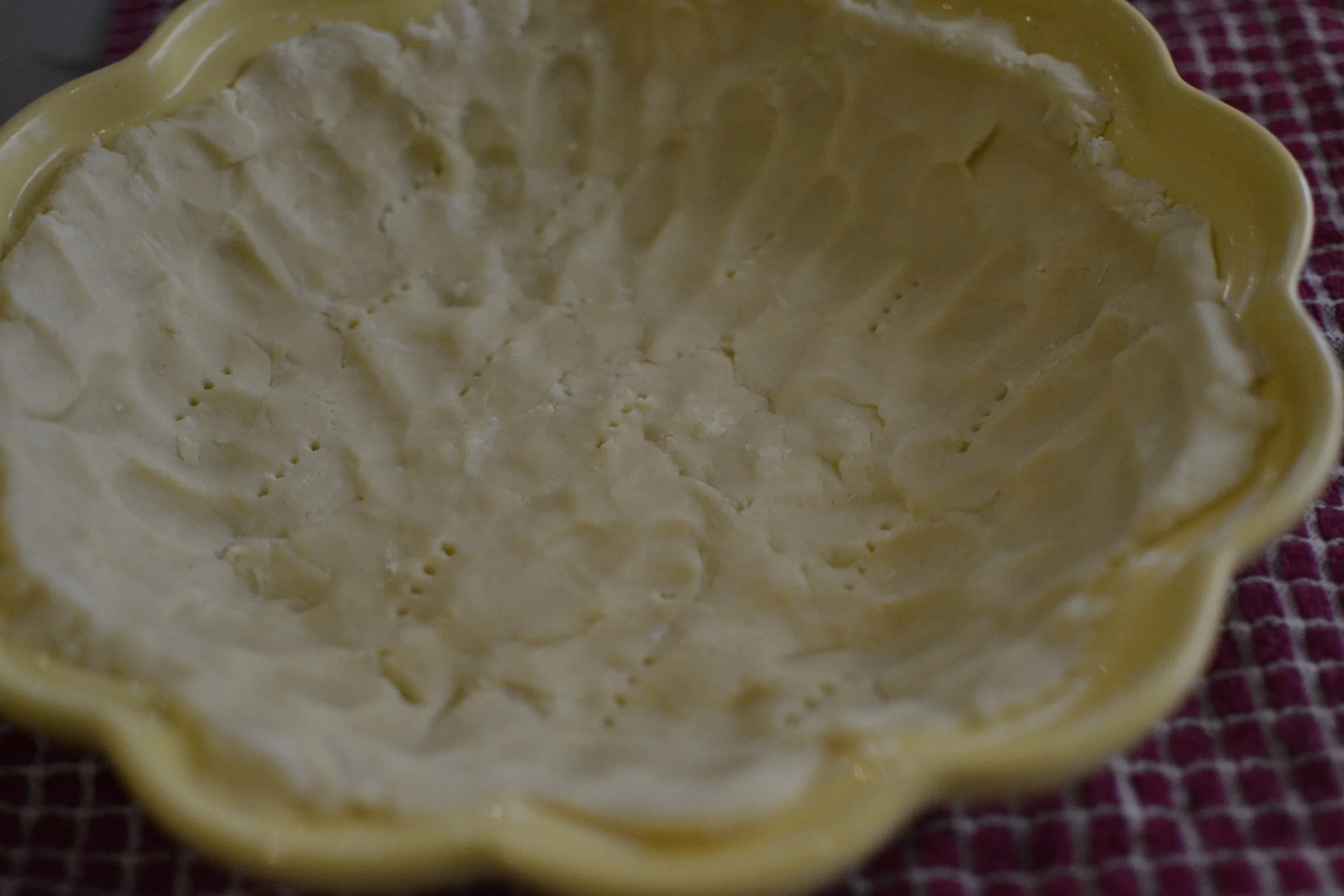 after the crust baked, i realized that it shrunk a little. next time, i will press it thinner and push it up to the edge a bit more. 
