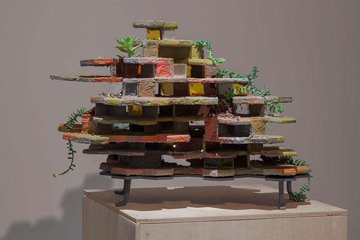 Plato's Retreat (satellite) , 2012, concrete, cardboard, acrylic, HO-scale figures, paint, wood, led lights and plants, 21 x 28 x 22"