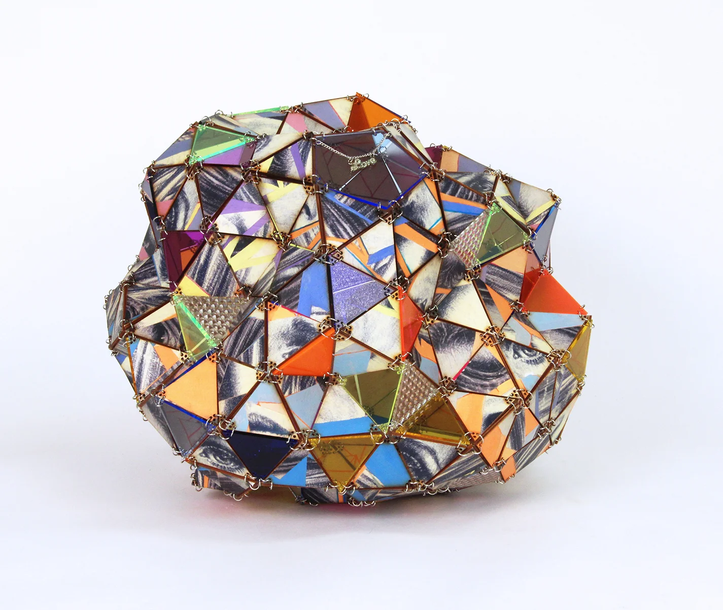   Barbra Ball,  2018, acrylic, collage on wood, found necklace fragment, 16” diameter (irregular) 