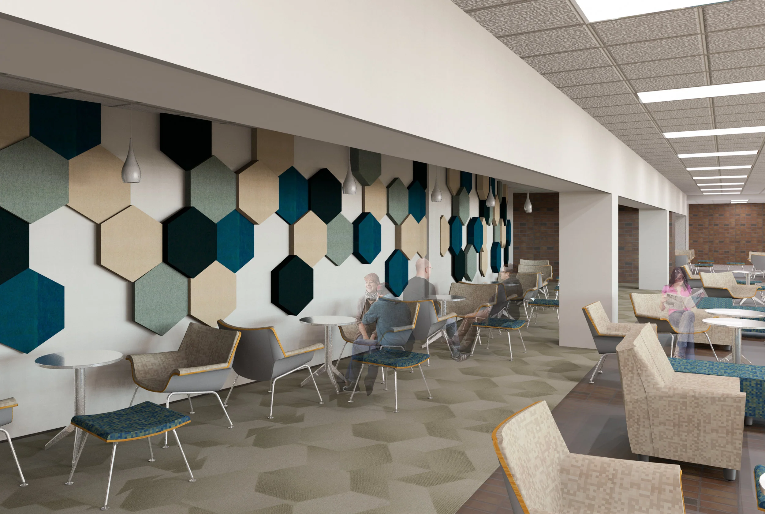Expanded Student Commons - Lounge A combination of existing reflective surfaces in the Commons creates daily acoustical challenges for the occupants, so in response we incorporated arrangements of vibrant acoustical pads throughout the space to help mitigate the noise. These larger arrangements energize an existing masonry wall behind the auditorium, and use color combinations to complement the school district’s strict color standards. A focus on soft seating in this area creates an intimate lounge for conversations and studying, while also contributing to sound mitigation within the Commons.