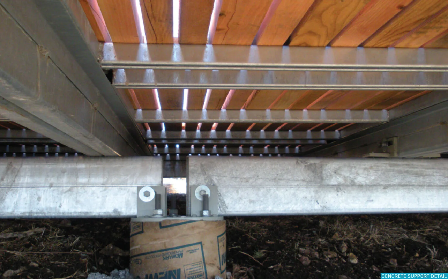 The wood decking is separated into small, similarly-sized panels that can be easily removed and carried by a pair of workers, allowing them to be repaired quickly and efficiently. Considering the prominent cantilever over the bluff and possible numb…