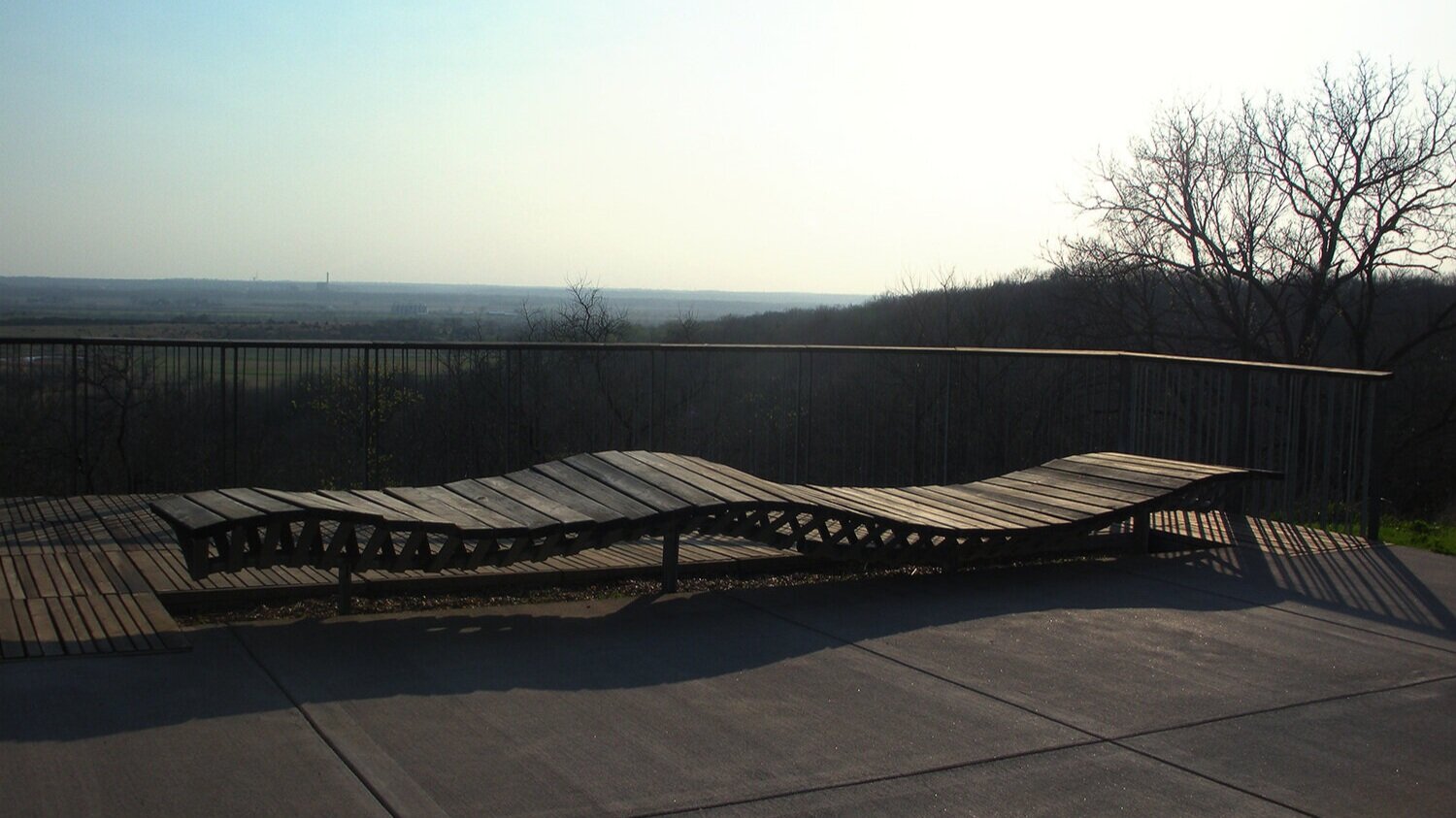 Providing a platform for experiencing the beauty and serenity of the natural Kansas landscape, this structure acts as both an escape into nature and a platform upon which the client can educate the public.