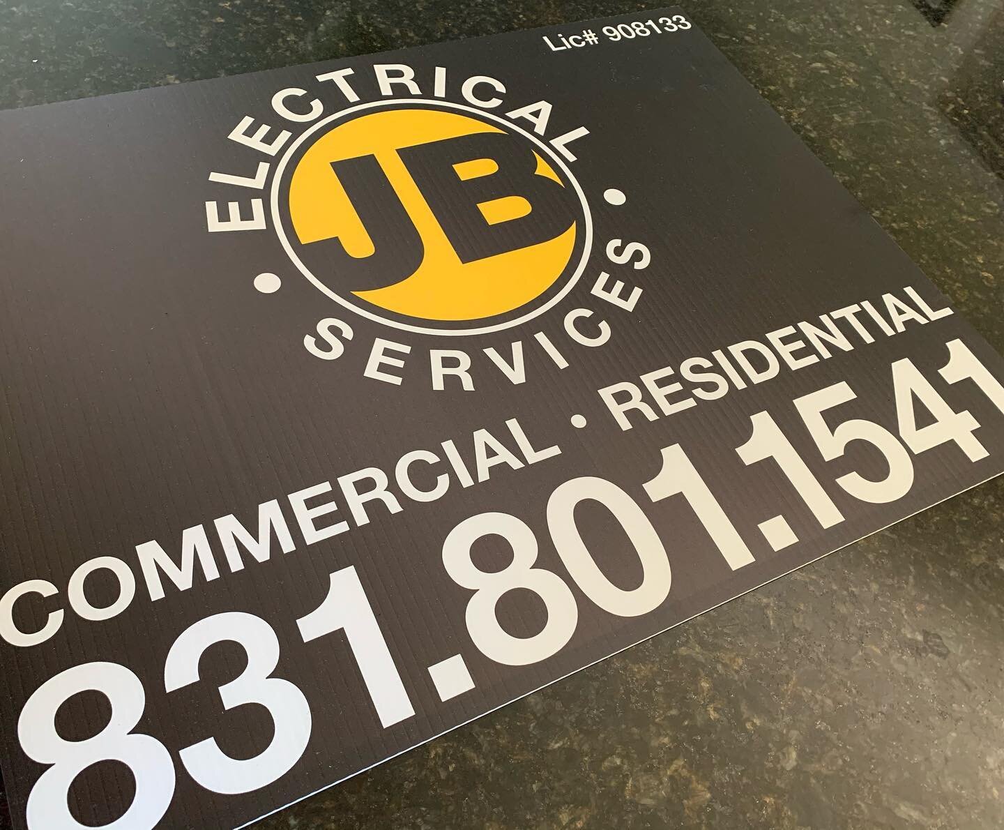 Coroplast yard sign and labels made for JB electrical @johnnyboke info@creativeGDS.com #coroplastyardsign #yardsigns #labels #stickers #graphicdesign #signanddesign
