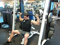 Behind the neck press - in his case, it also comes with a strained neck!