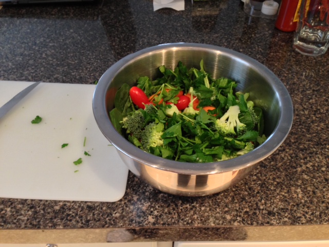 Pictured: spinach, arugula, broccoli, tomatoes, parsley, and carrots in a huge mixing bowl Not pictured: my post-lunch salad coma