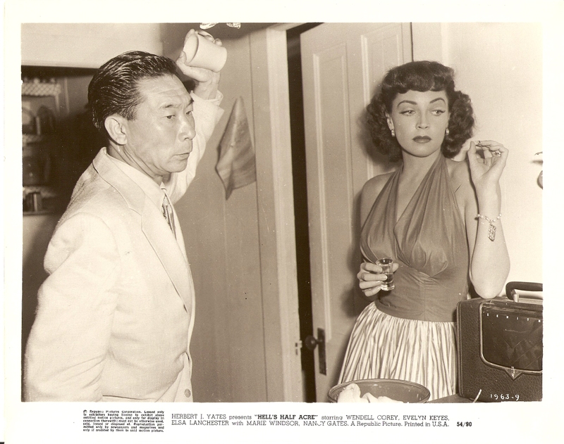 Roger Kong (Philip Ahn) and Rose Otis (Marie Windsor)