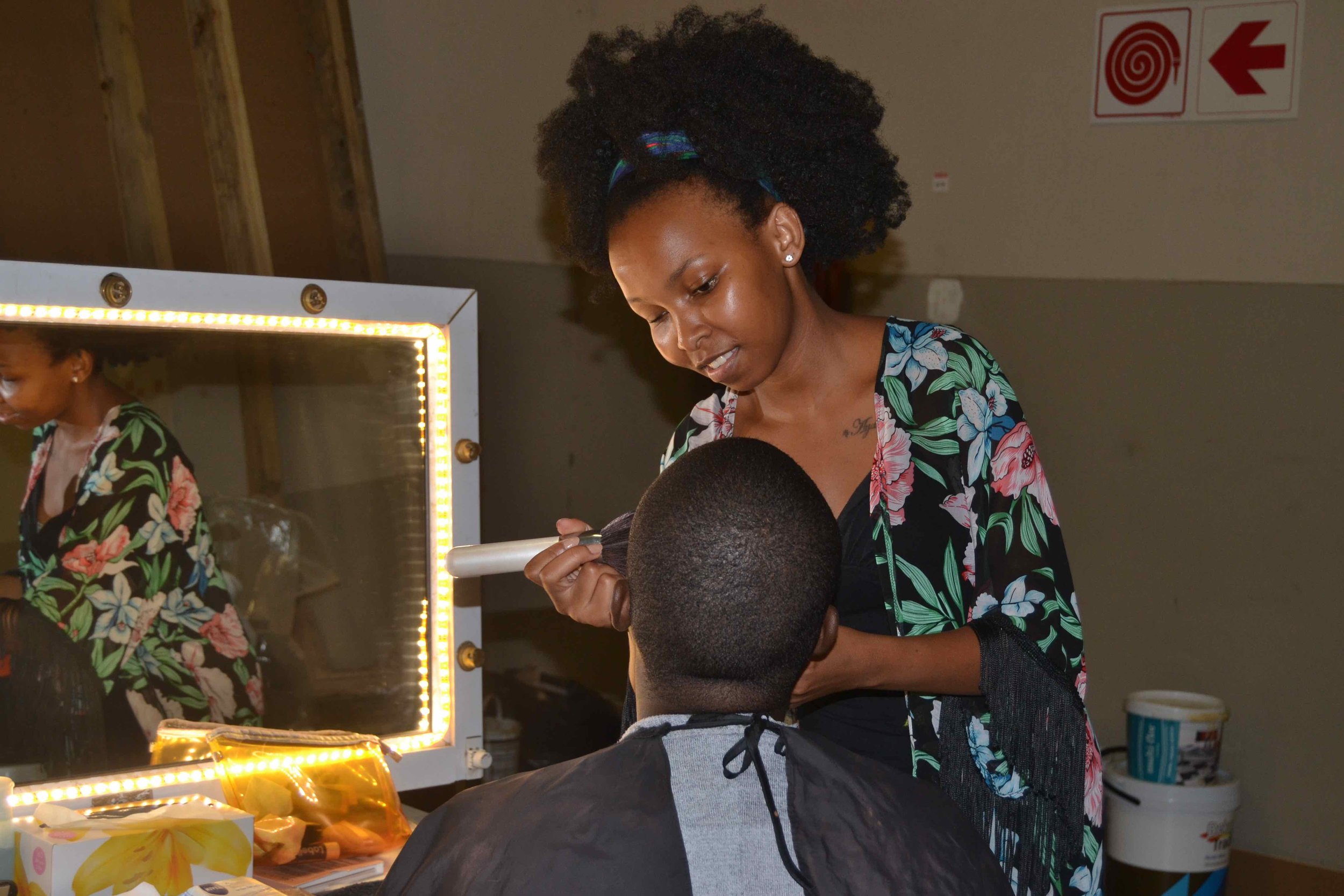 Trainee Pinky Sozombile  in the make-up department on the set of UzaloDSC_6264.jpg
