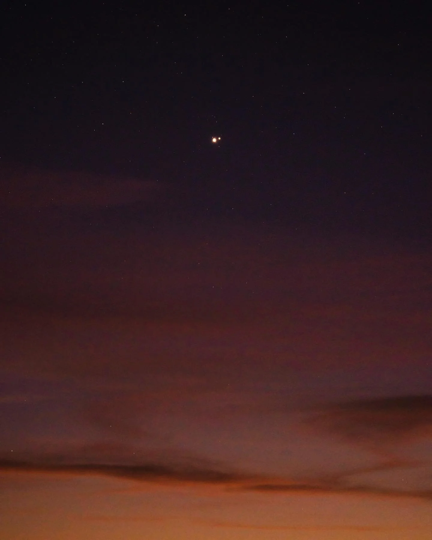 Jupiter and Saturn appeared to nearly collide in the southwest sky tonight (though in reality Saturn is over 400 million miles beyond Jupiter and almost exactly 1 billion miles from earth.) Swipe for a closer look... #christmasstar