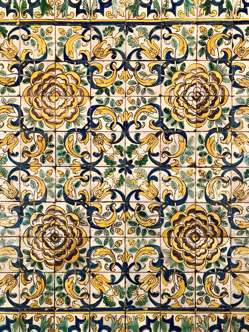 Why are the buildings in Portugal covered in tile?