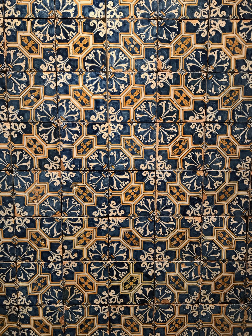 Why are the buildings in Portugal covered in tile?