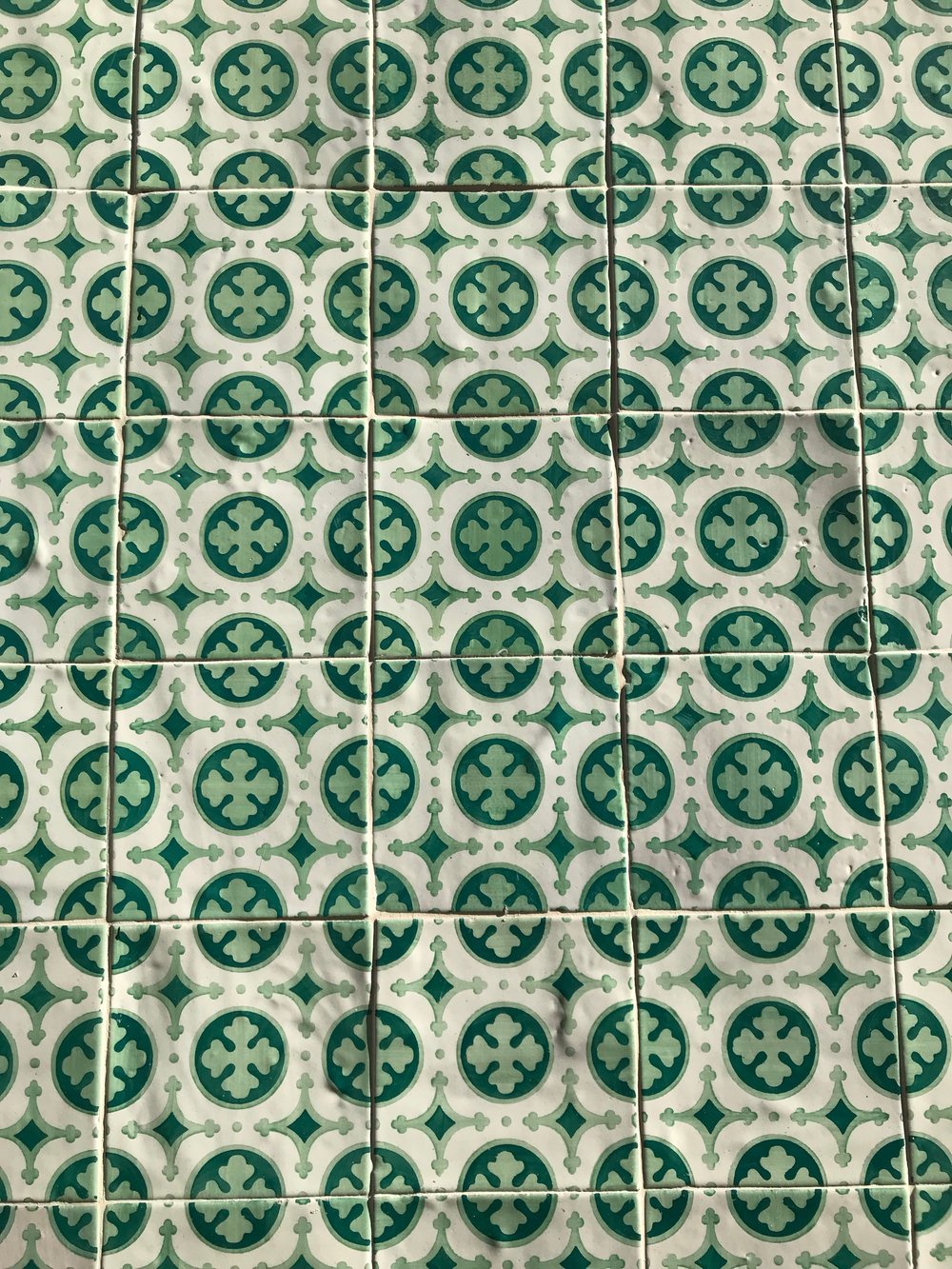 Why are the buildings in Portugal covered in tile?