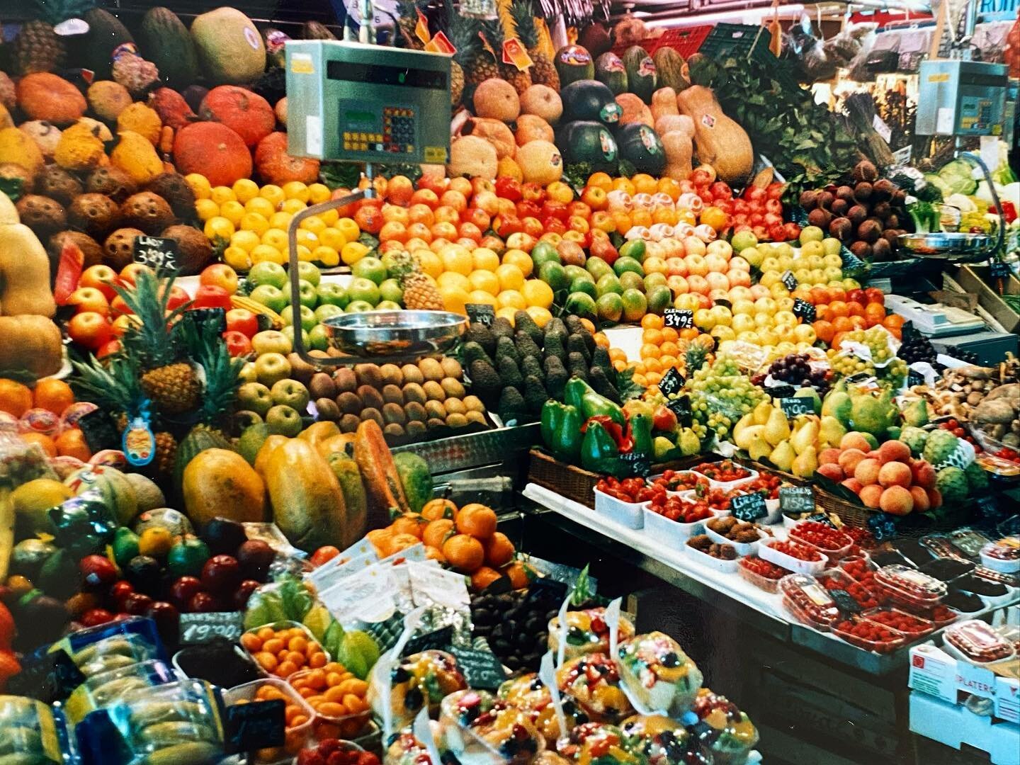The magic that is a Spanish fruit market is indescribable. This is a shot from a 2004 visit to Barcelona&mdash;20 years later I am still dreaming about it. #spain #barcelonatravel #fruitmarket.