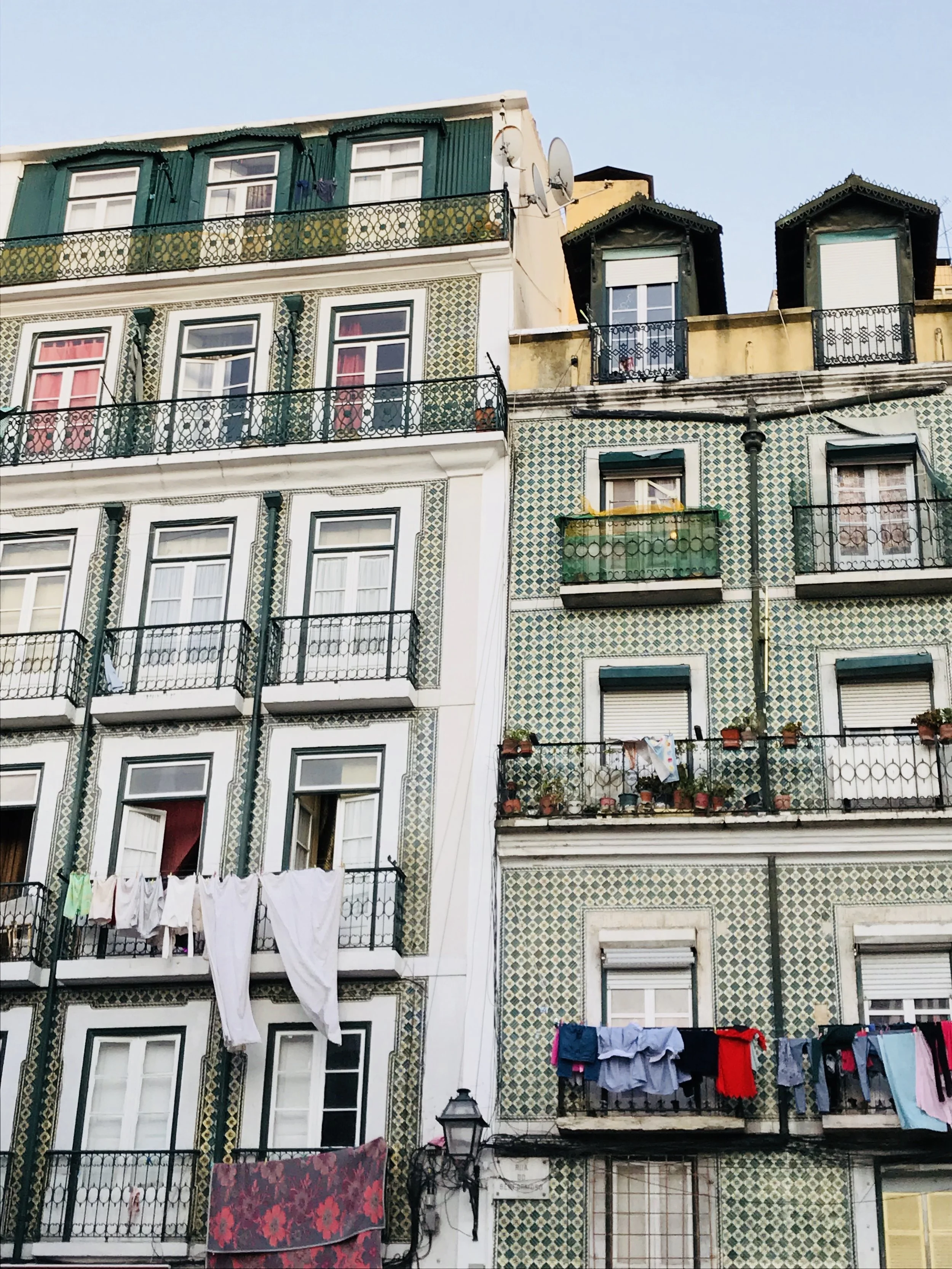 Tile covered buildings and laundry in Lisbon