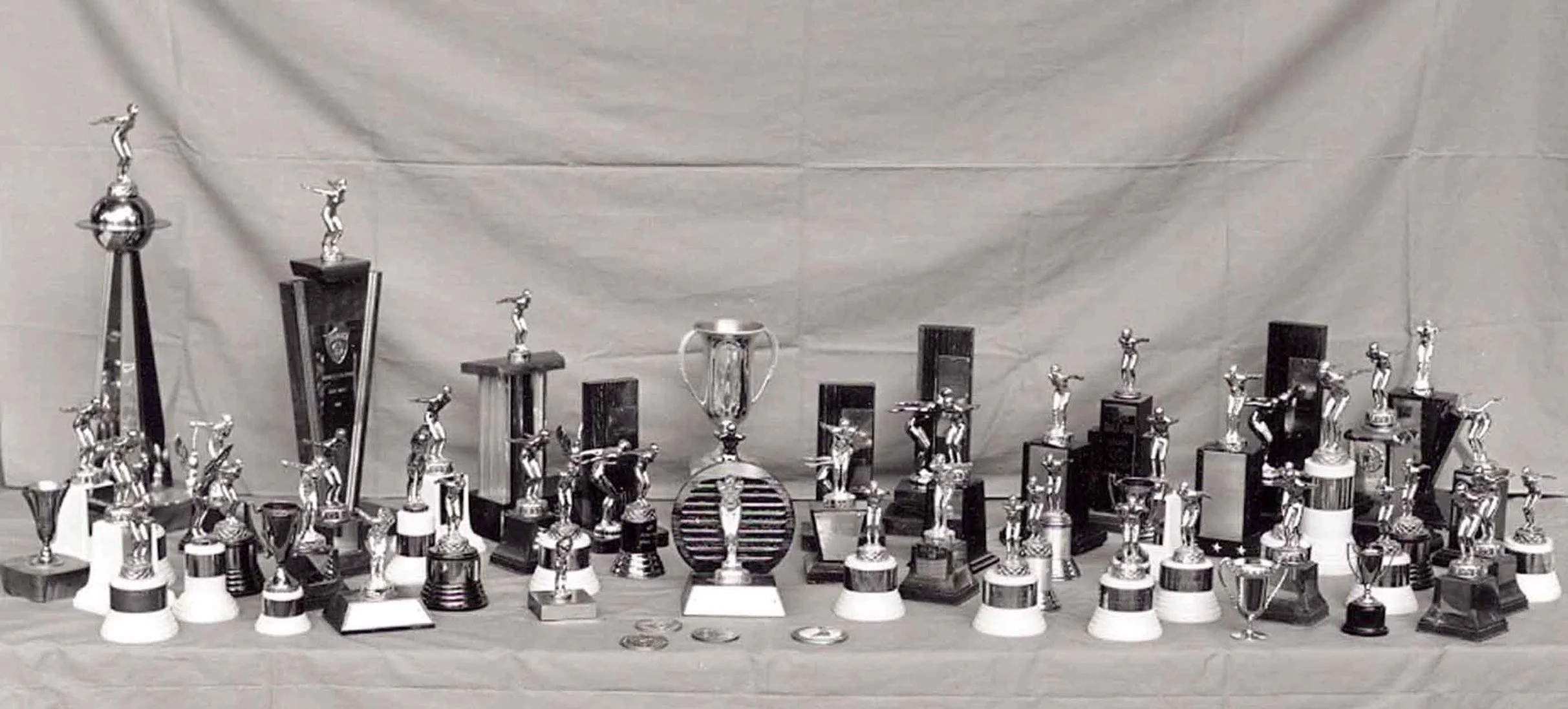 1961 trophies on table.jpg