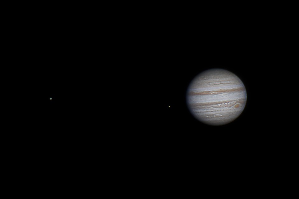   &nbsp;  Jupiter and a couple of its moons are seen in February 2014. (ART COLE)  