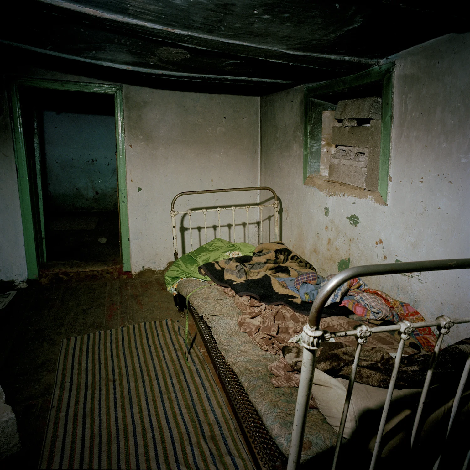 Natasha, 26-years-old and suffering from
mental illness resides in this rancid and dirty, pitch-dark bedroom in her
mother’s house on the outskirts of Chisinau, Moldova.
0
false
18 pt
18 pt
0
0
false
false
false
/* Style Definitions */
table.MsoNormalTable
{mso-style-name:"Table Normal";
mso-tstyle-rowband-size:0;
mso-tstyle-colband-size:0;
mso-style-noshow:yes;
mso-style-parent:"";
mso-padding-alt:0cm 5.4pt 0cm 5.4pt;
mso-para-margin:0cm;
mso-para-margin-bottom:.0001pt;
mso-pagination:widow-orphan;
font-size:12.0pt;
font-family:"Times New Roman";
mso-ascii-font-family:Cambria;
mso-ascii-theme-font:minor-latin;
mso-hansi-font-family:Cambria;
mso-hansi-theme-font:minor-latin;}
She left for Moscow to work in a restaurant prior to this, but ended up
trafficked on the streets instead. One day, an unidentified driver ran his car
into her and a group of street girls. She suffered physical injuries and her
already poor mental condition worsened. According to her file in an after-care
center where she came and went, “men (from her home village in Moldova) started
coming over (to this room), taking her away and abusing her, whoever pleased.”