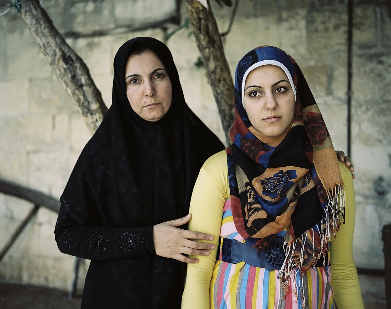 Ragda (36) and her 7-months pregnant daughter Nora (19) at a shelter for widows in Gaziantep, Turkey. Ragda lost her husband and two sons in a barrel bomb attack in her old neighborhood in Syria. "We cannot make plans for our future until Syria is whole again." - Ragda S.