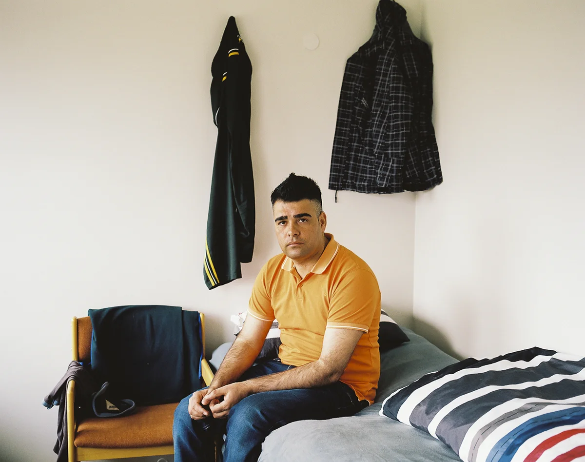 Ihsan (29) in his room in a shelter for asylum seekers in Akranes. Waiting for over three months for a positive answer, Ihsan reasoned he had no choice but to flee Pakistan after the Taliban issued multiple threats on his life for assisting the international non-profit Doctors without Borders as a practicing Muslim. Boredom and anxiety face asylum seekers in limbo who are not permitted to work and particularly those who live in shelters isolated in rural areas, distant and difficult to reach from the capital, Reykjavik.
