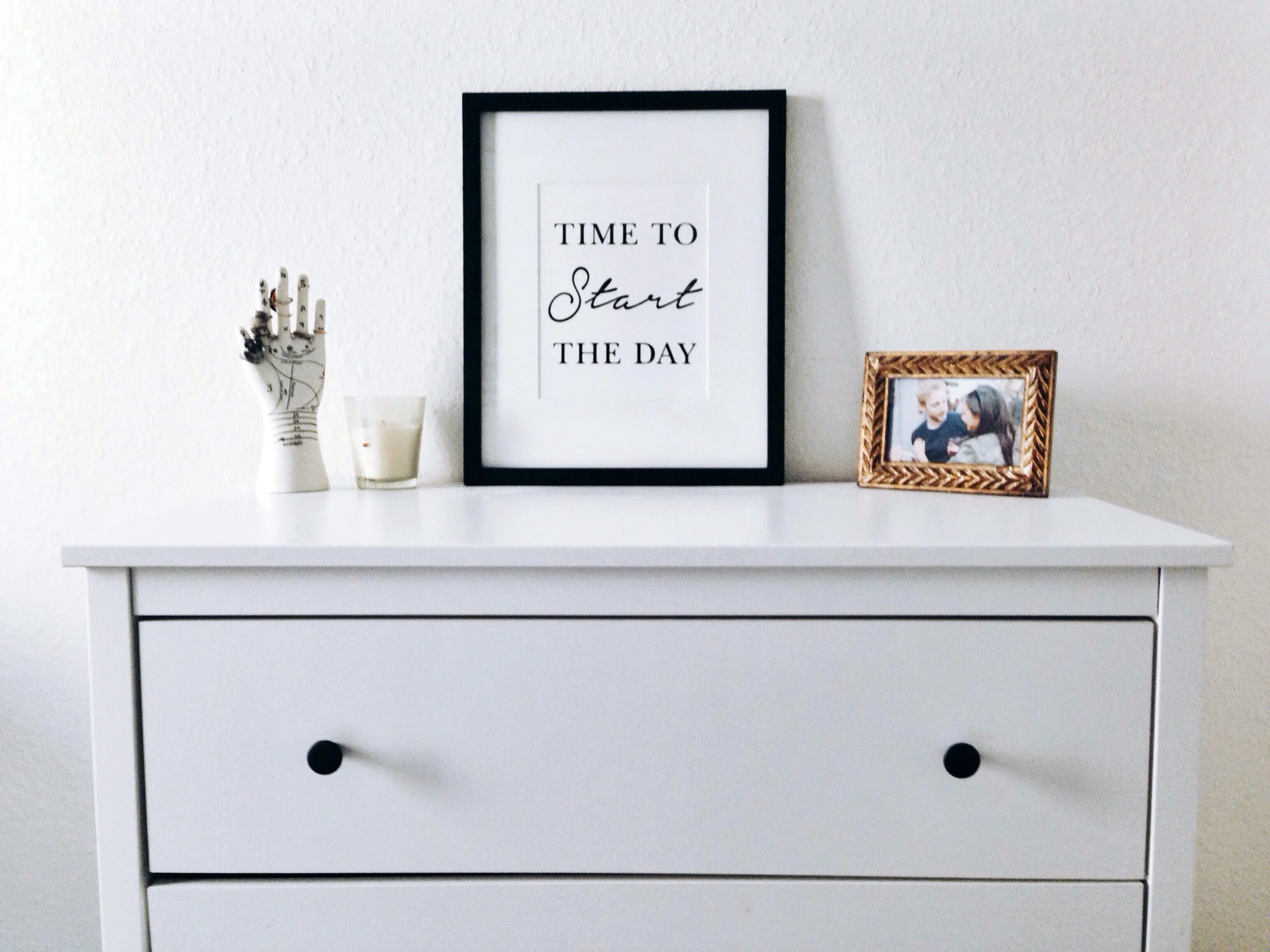 IKEA Koppang 3-drawer chest / URBAN OUTFITTERS astrological jewelry stand / WORLD MARKET gold leaf frame