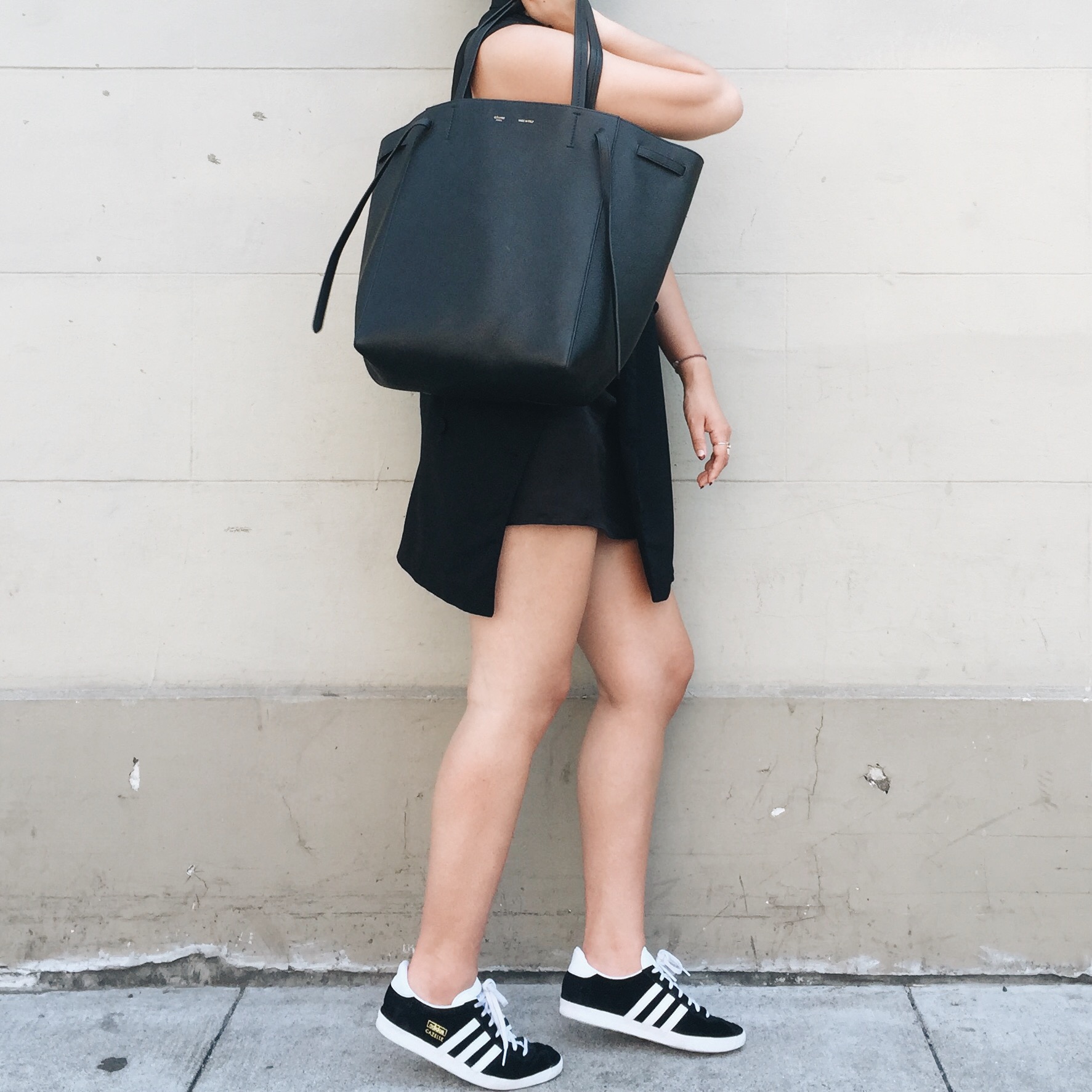 ALEXANDER WANG vest (similar here ) / ZARA satin slip / ADIDAS Gazelle sneakers / CELINE Phantom cabas tote