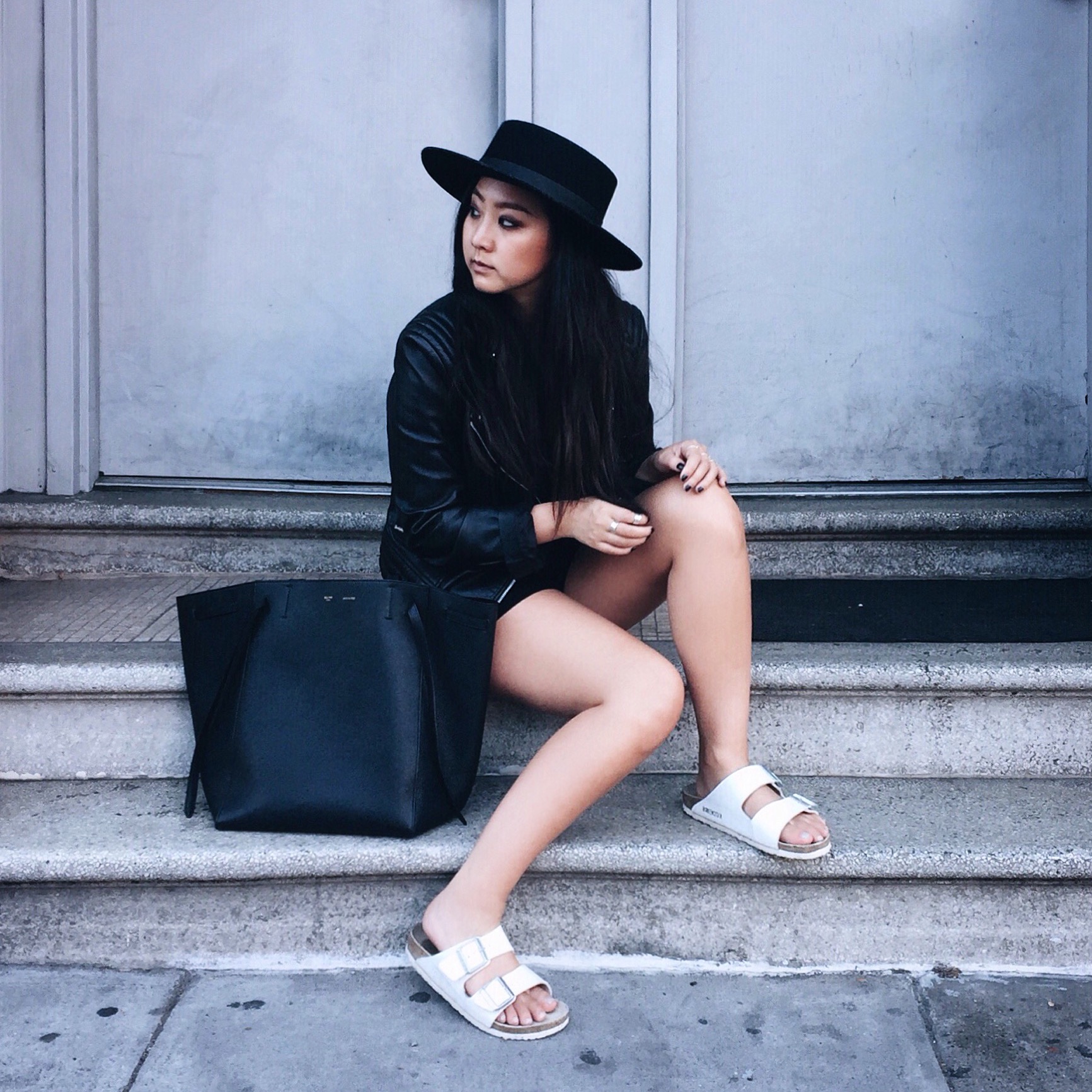 BIRKENSTOCK sandals / MANGO leather jacket (similar here ) / MANGO romper / CELINE Phantom tote / JANESSA LEONE Gabrielle hat