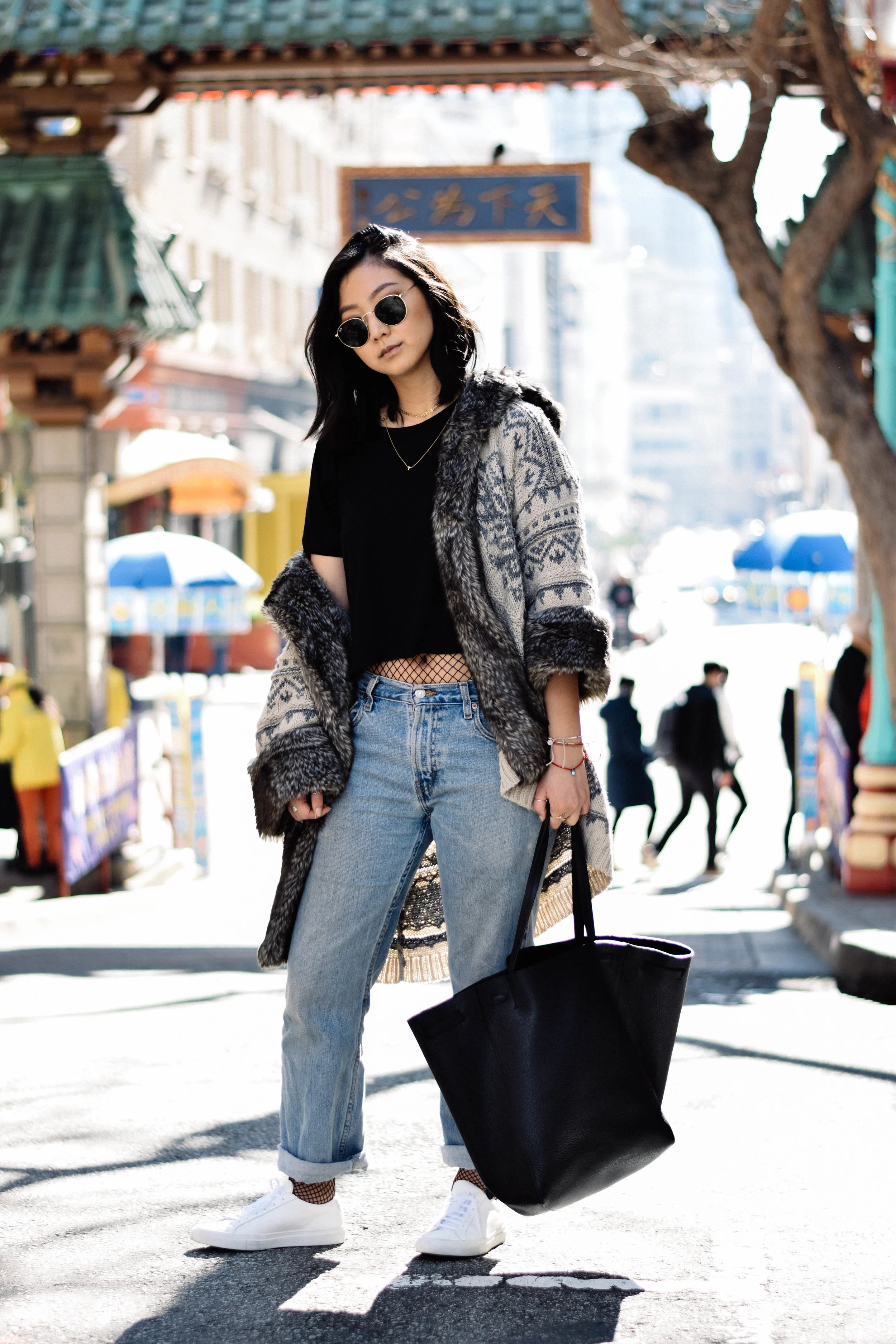 ZARA sweater / ZARA crop tee / ASOS fishnet stockings / LEVI's jeans / COMMON PROJECTS sneakers / CELINE cabas tote / RAY-BAN retro-round sunglasses