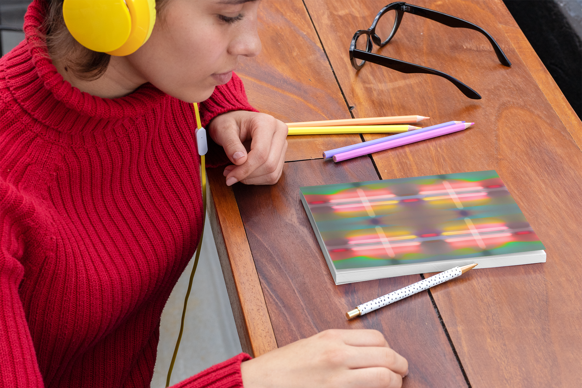 mockup-of-a-woman-ready-to-write-on-her-notebook-29948.png