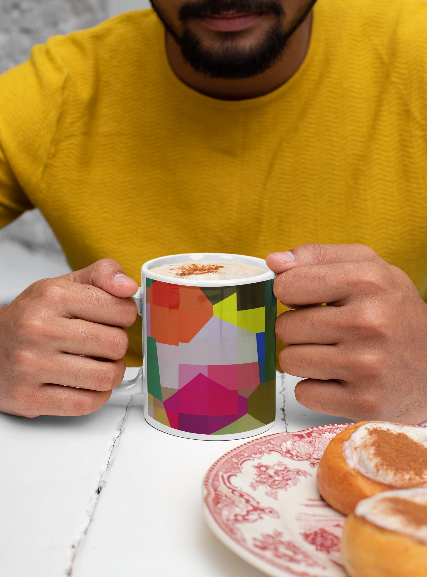 mockup-of-a-bearded-man-holding-an-11-oz-mug-in-front-of-some-bagels-29099.png