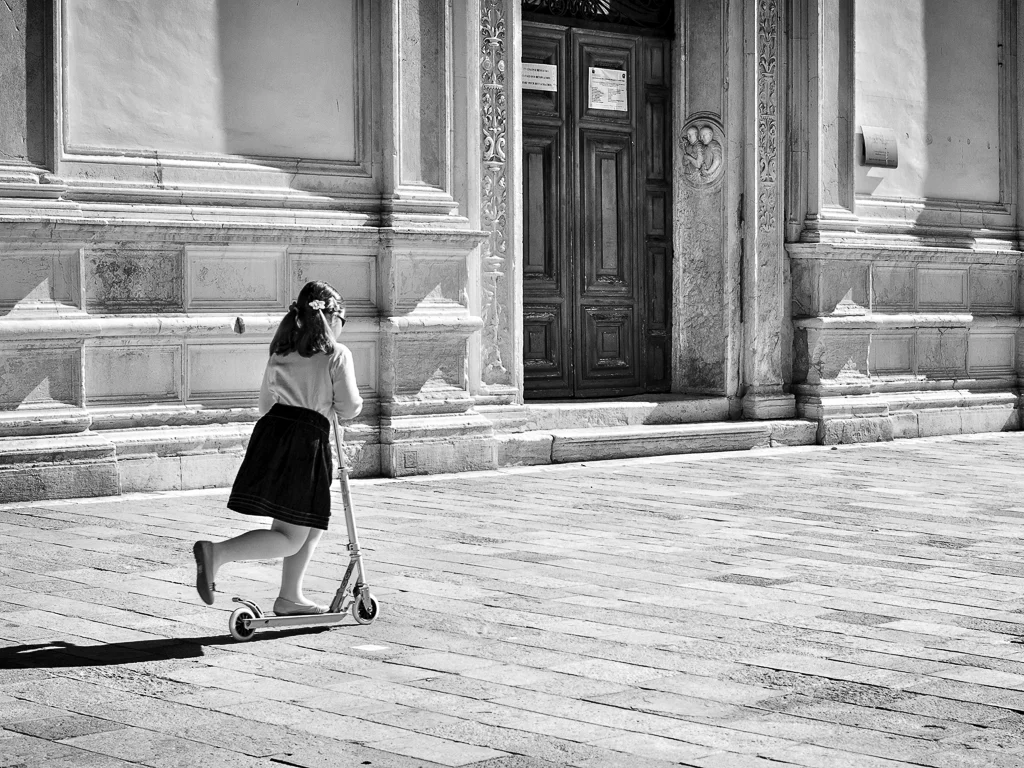 A girl on a skate in the Zattere